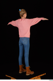 Shenika blue jeans brown shoes workers pink sweater standing t-pose…